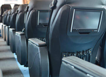 Leather seats and video entertainment system onboard Odyssey express bus